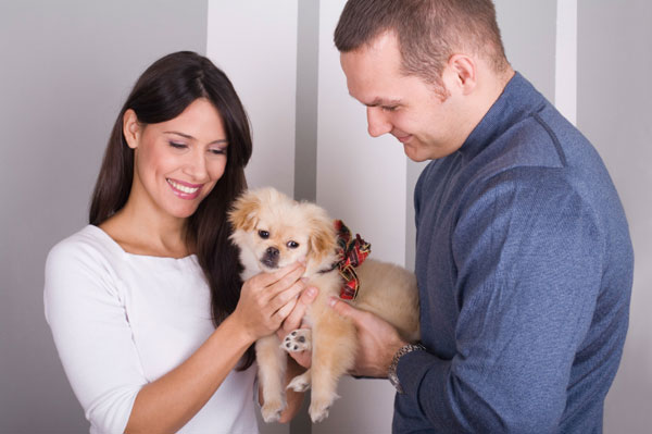 Woman flirting with man with dog