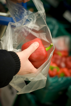 Woman buying pepper