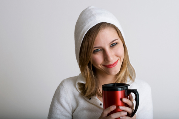 Woman drinking hot drink