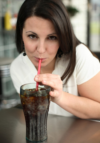 http://cdn.sheknows.com/articles/woman-drinking-soda.jpg