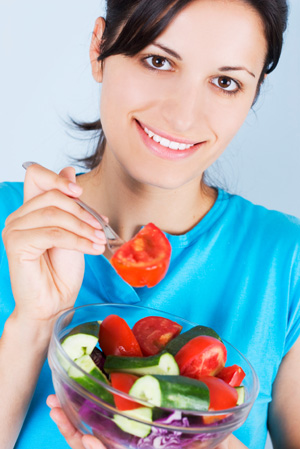Woman Eating Salad