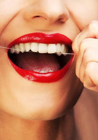 Woman Flossing