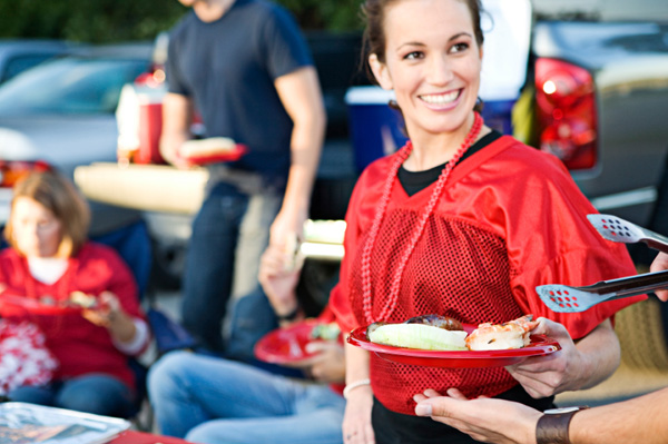Woman in Football Jersey with Food