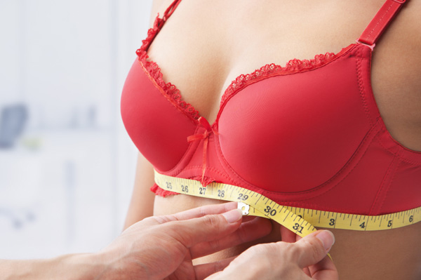 Woman having bra fitting