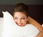 Woman in comfortable bed