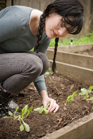 Woman Planting Garden