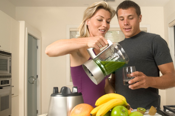 Woman Pouring Smoothie