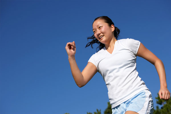 Woman Running in the Summer