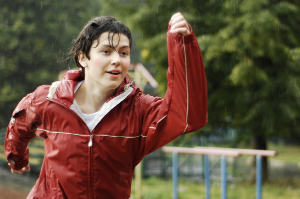 Woman Running in the Rain