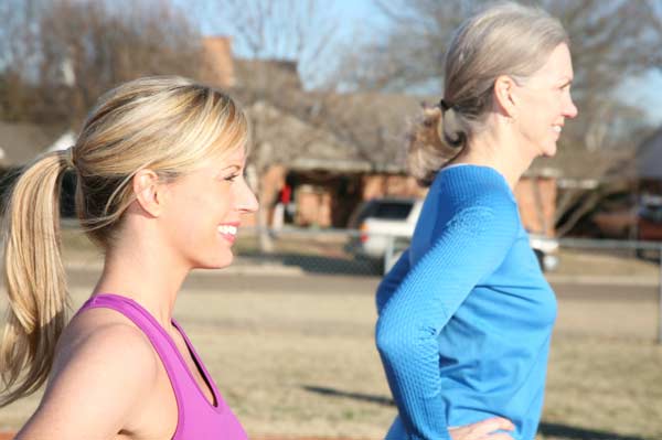 Woman running with friend