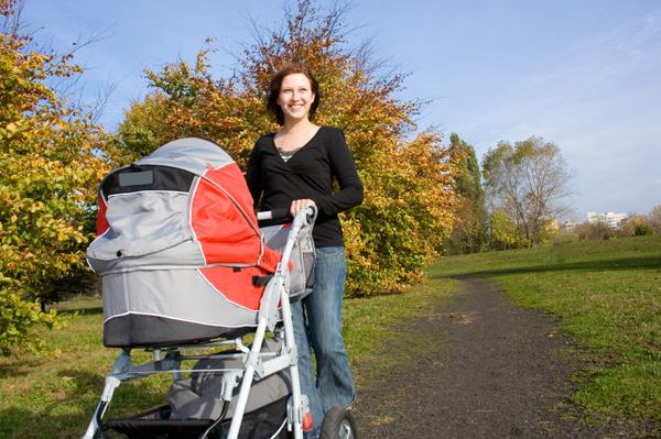 Woman walking with stroller