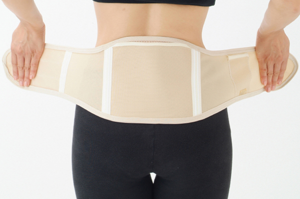 Woman with belly wrap