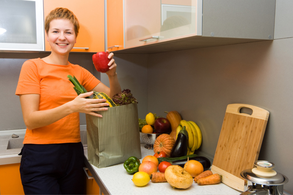 Woman with fruits and vegetables