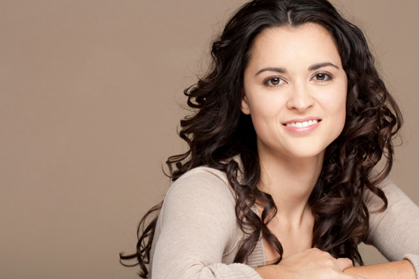 Woman with long hair wearing v-neck