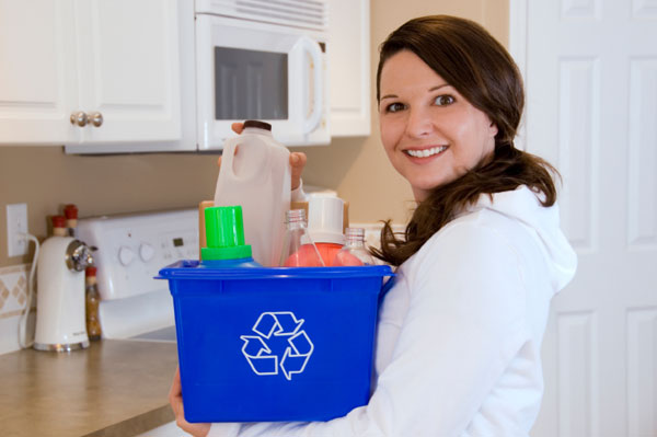 Woman with Recycling Bin