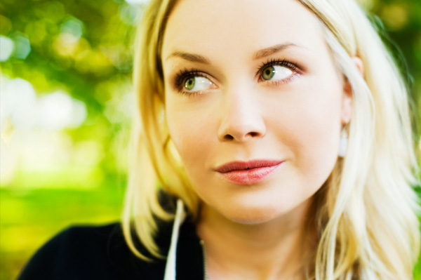 Woman with slight smile