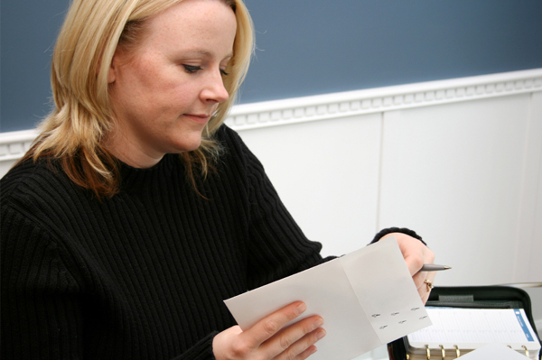 Woman writing invitations