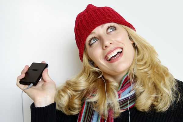 Woman Listenin to Holiday Music