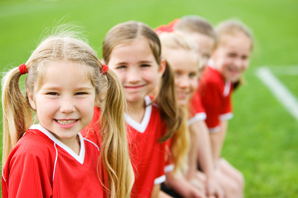 soccer pictures for girls. Young Soccer Playing Girls