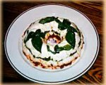 Cheese spread with pesto, tapenade and sun dried tomatoes