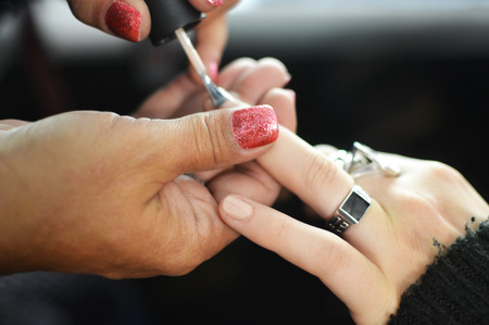 This BCBG model wore Samoan Sand by OPI on both nails and toes. 