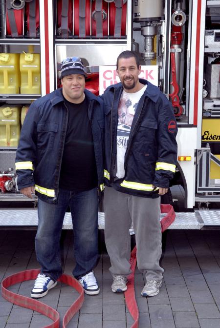 Kevin James and Adam Sandler pose on the movie set