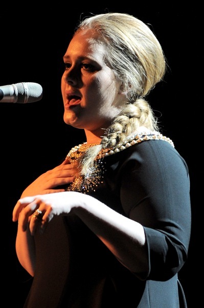Adele with a single braid