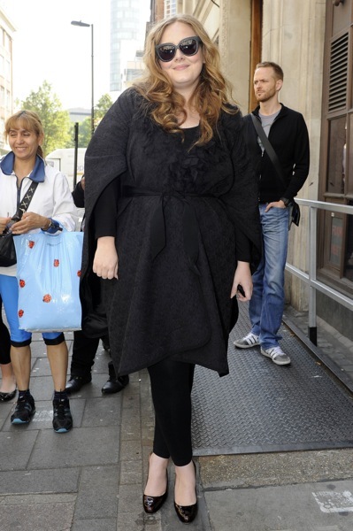 Adele with floral overcoat