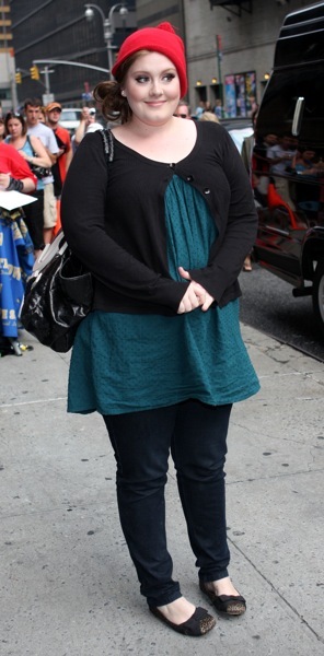 Adele in a cardigan