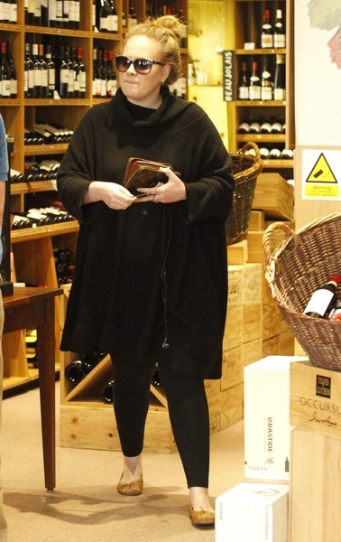 Adele in gold flats