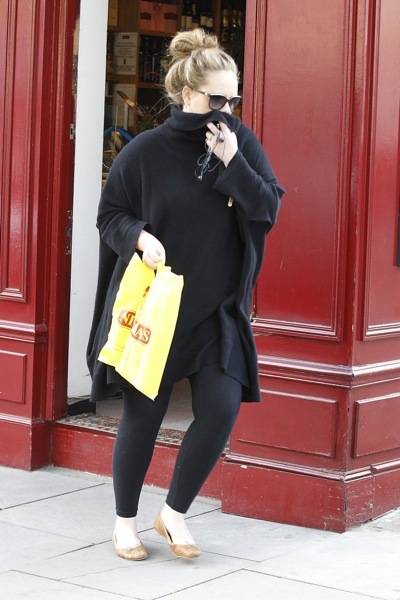 Adele with a high bun
