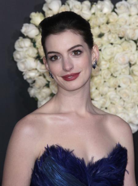 Anne Hathaway’s tight elegant up-do