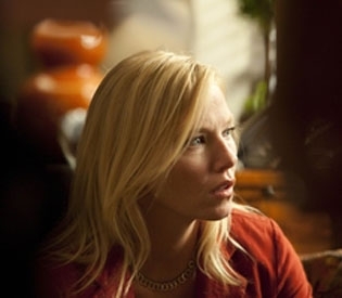Kelli Giddish as Annie Frost in Chase