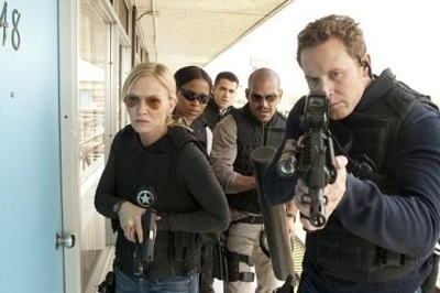 Kelli Giddish as Annie Frost in Chase