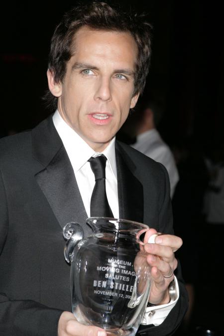 Ben Stiller  holding a glass award