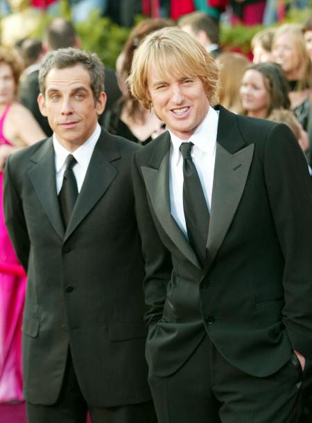 Ben Stiller and Owen Wilson standing with arms at their sides at the Academy Awards
