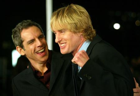 Owen Wilson makes a fist next to Ben Stiller while at their movie premiere