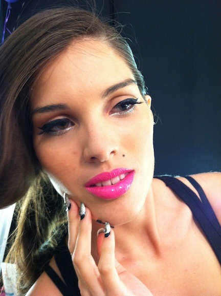 A Betsey Johnson model shows off her butter LONDON manicure.
