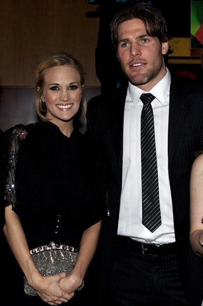 Carrie Underwood with clutch