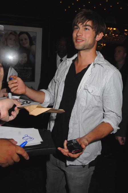 Chase Crawford signs autographs for adoring fans 