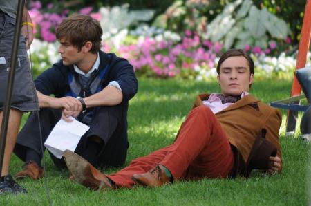 Ed Westwick wears red pants next to Chase Crawford in Gossip Girls