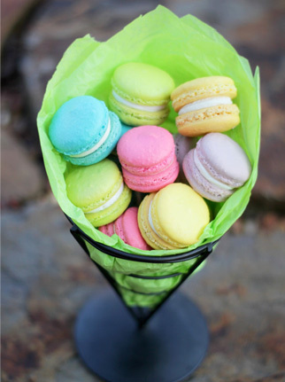 Colorful macarons in paper cone 
