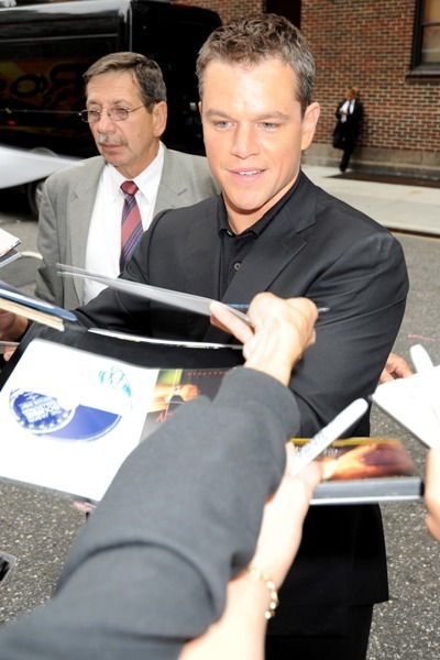 Matt Damon signs for fans