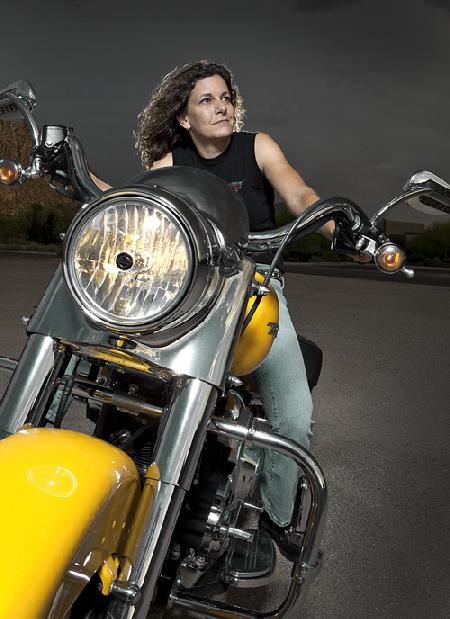 Darnell and her Harley-Davidson in the desert