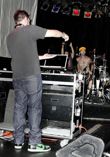 DJ AM and Travis Barker on stage
