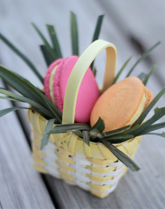 Easter egg macarons in basket 