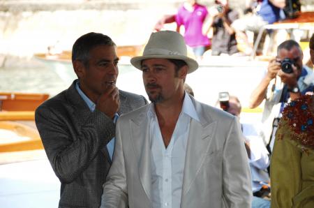 Brad Pitt and George Clooney get photographed at the Venice Film Festival