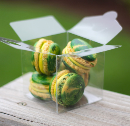 Green and yellow swirled macarons