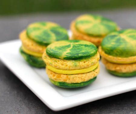 Green and yellow swirled macarons