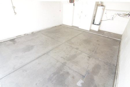 BEFORE: Cleared-out garage, ready to be renovated